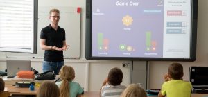 Teacher in front of classroom